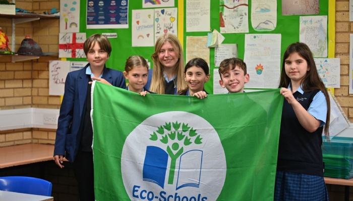 Pupils at St John Plessington awarded a coveted Eco-Schools Green Flag. ​​​​​​​